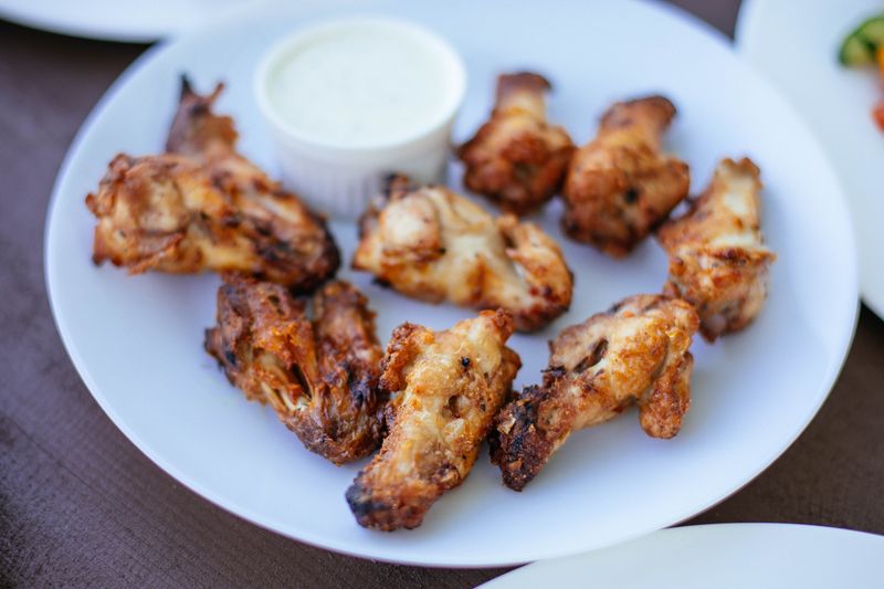 Wing Snob kitchen — bold wings being prepared in West Chicago
